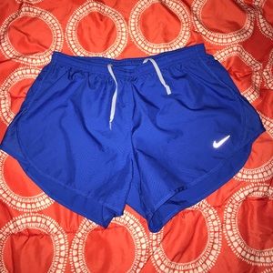 Medium blue Nike running shorts